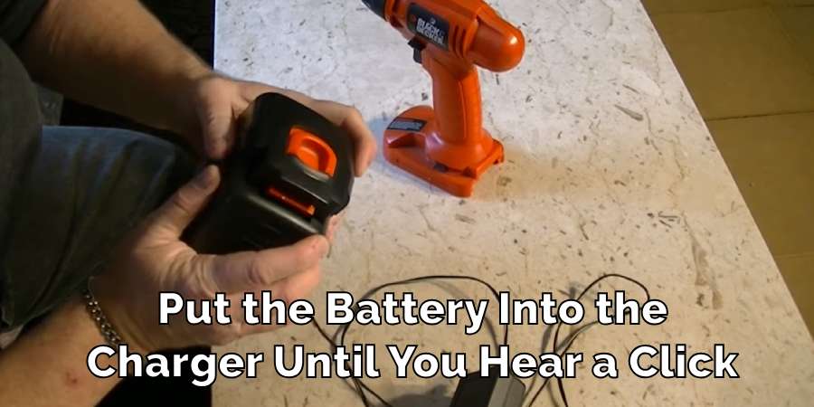 Put the Battery Into the
Charger Until You Hear a Click