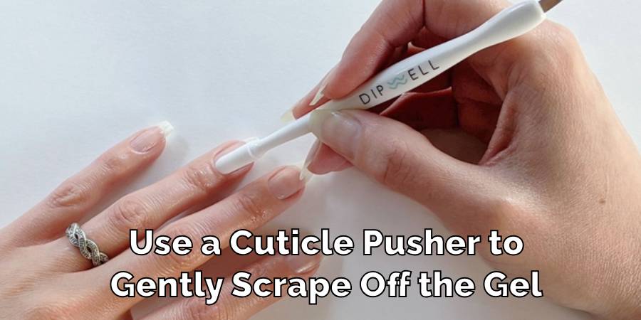 Use a Cuticle Pusher to
Gently Scrape Off the Gel