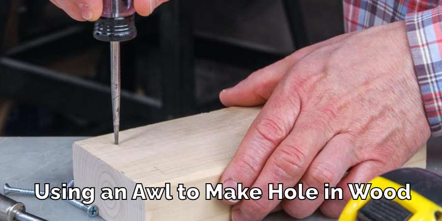 Using an Awl to Make Hole in Wood