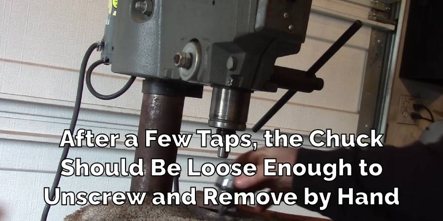 After a Few Taps, the Chuck
Should Be Loose Enough to
Unscrew and Remove by Hand